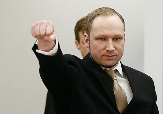 Breivik raises his fist as he arrives to the courtroom for the first day of his trial in Oslo in 2012. (Fabrizio Bensch/Reuters)