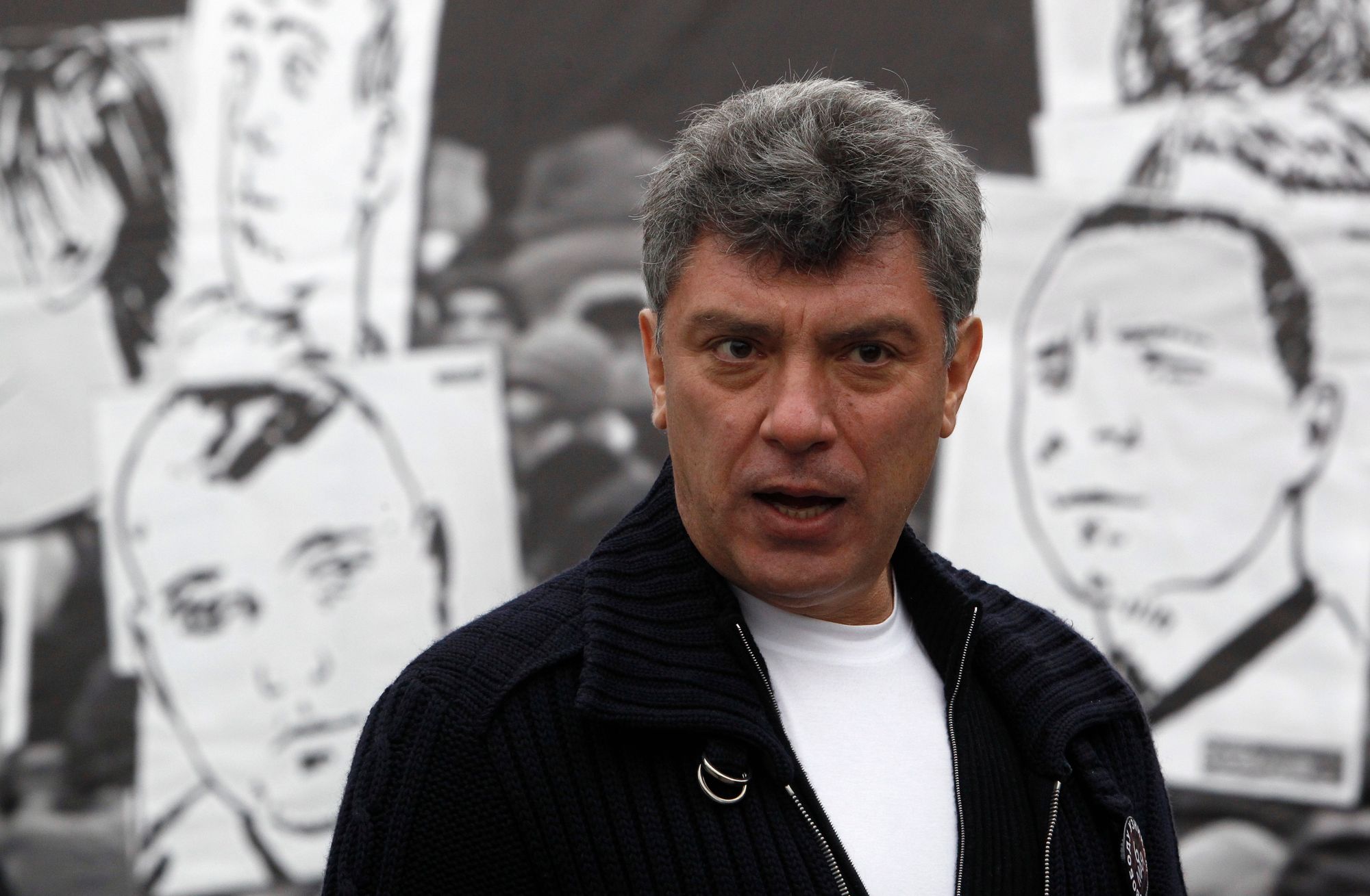 Opposition leader Boris Nemtsov attends a rally in central Moscow, April 6, 2013. Protesters demanded the release of anti-government activists detained at Moscow's Bolotnaya Square on May 6, 2012, the eve of Putin's inauguration. REUTERS/Sergei Karpukhin (RUSSIA - Tags: POLITICS CIVIL UNREST) - RTXYANV