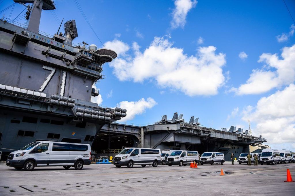 Hàng không mẫu hạm USS Theodore Roosevelt ở cảng Guam. Ảnh: Reuters.