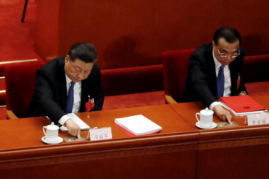 Lãnh đạo Trung Quốc ấn nút thông qua nghị quyết thúc đẩy Luật An ninh Quốc gia ở Hong Kong, ngày 28/5/2020. Ảnh: Reuters.