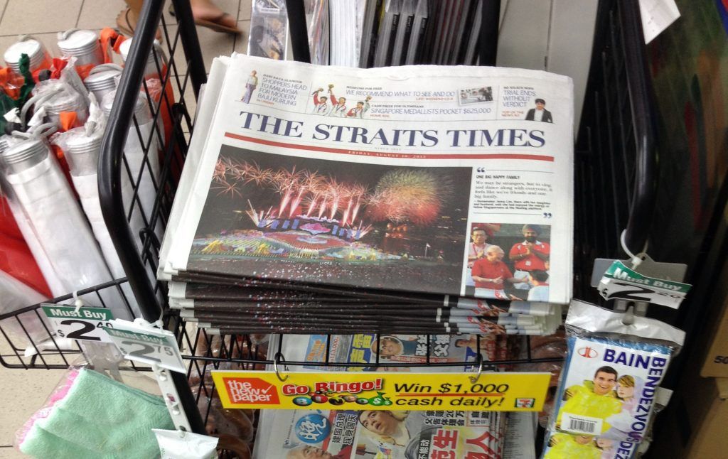 Một sạp báo in ở Singapore. Ảnh: SPH.