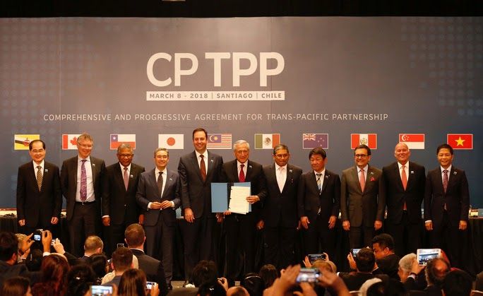 Sau khi Mỹ rút lui, 11 nước còn lại ký hiệp ước thương mại CPTPP. Ảnh: Reuters. 